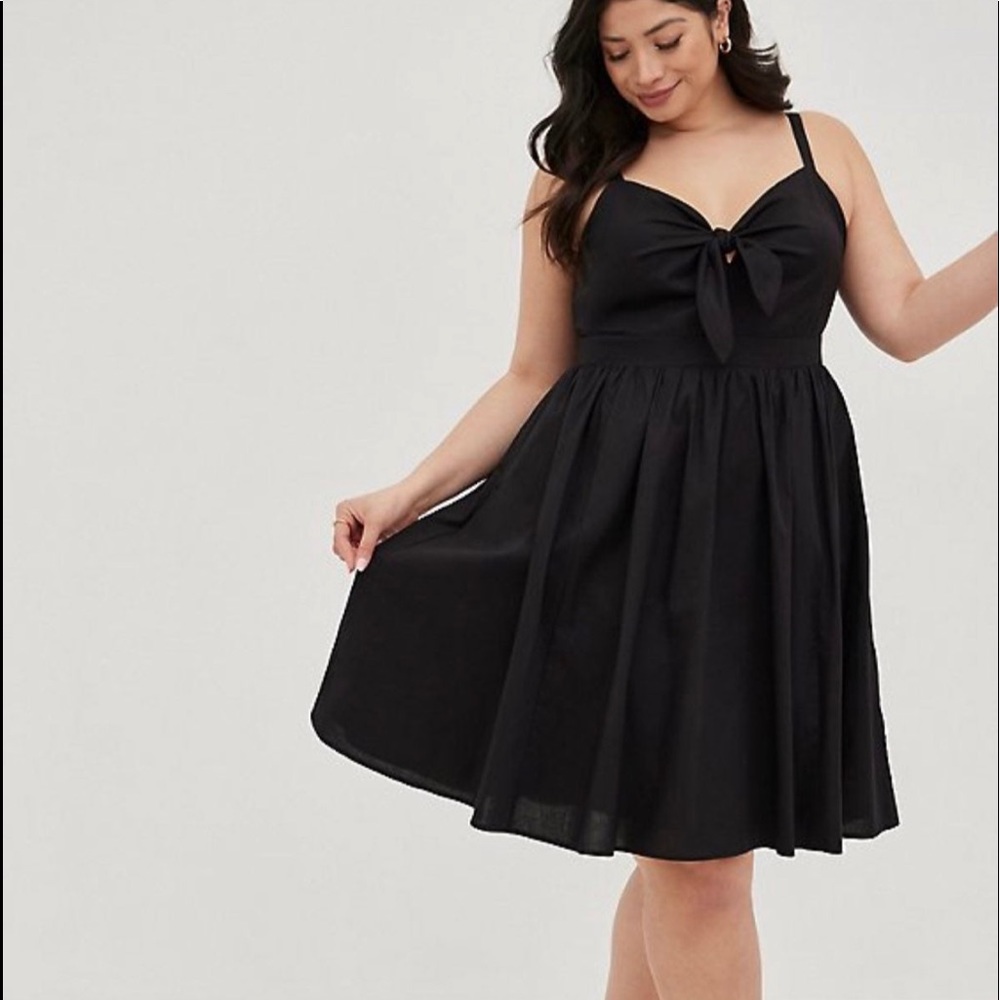 Fit and Flair black skater dress with cute tie in front